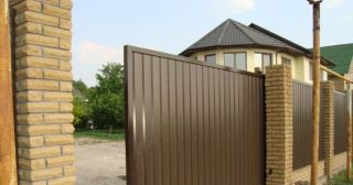 Купить откатные ворота из профнастила Стрежевой, цена от 1775 руб.